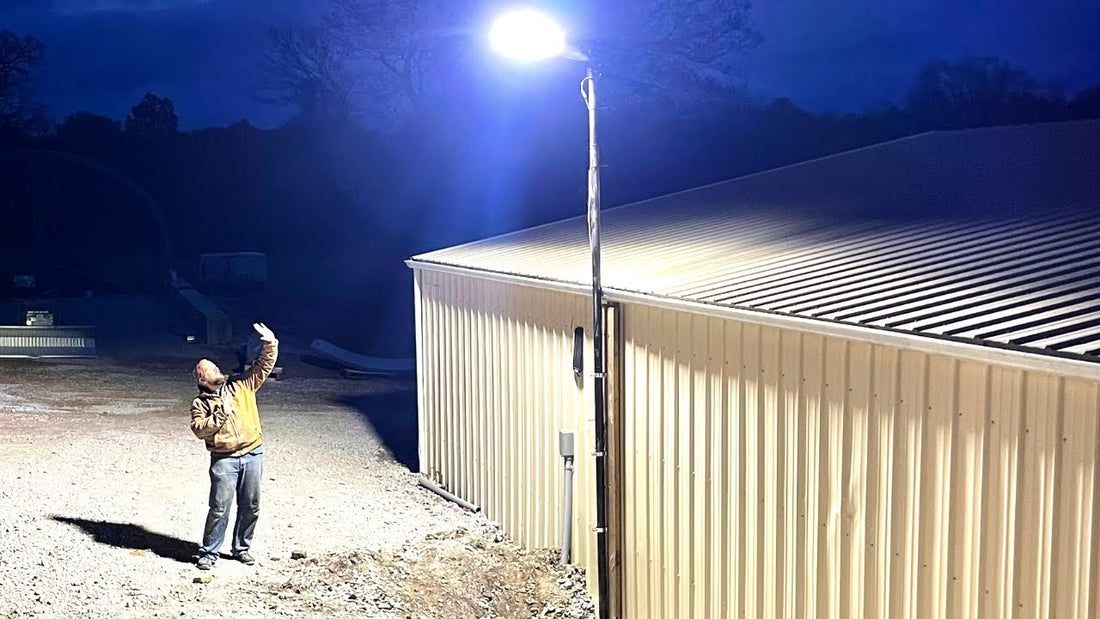 LED parking lot light installed on a pole providing bright outdoor illumination for a commercial building area at night